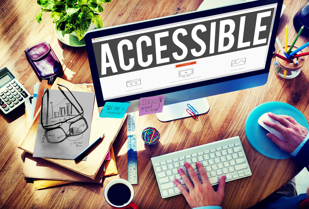 Un pc con la scritta "accessible" a simboleggiare un validatore di accessibilità